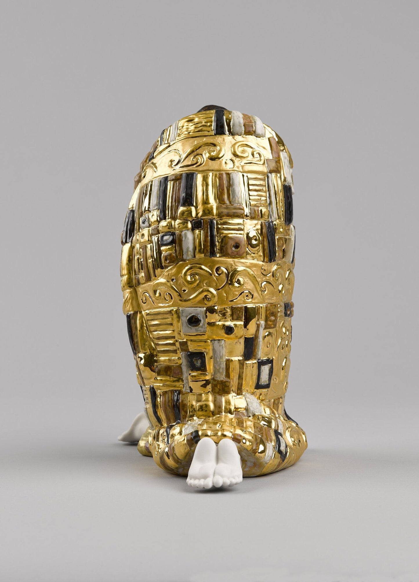 01008667 | Escultura El Beso. Lustre oro