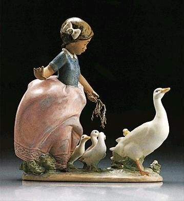 01012306 | NIÑA CONDUCIENDO PATOS Tipo 237