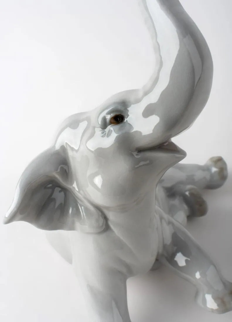 01008491 | Figura Elefante bebé con flor rosa