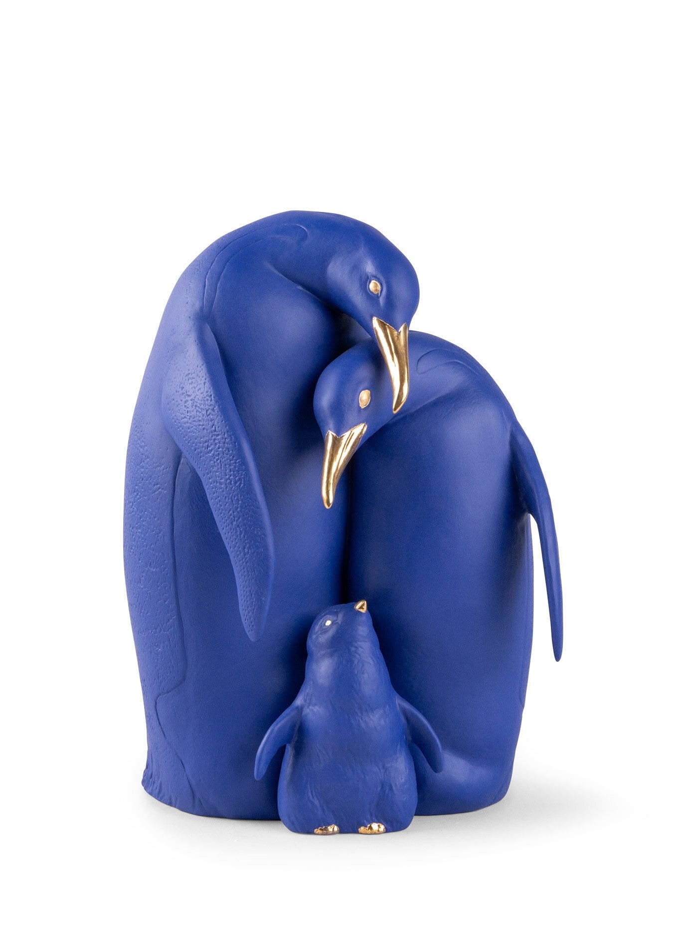 01009539 | Escultura Familia de pingüinos. Serie Limitada. Azul y dorado