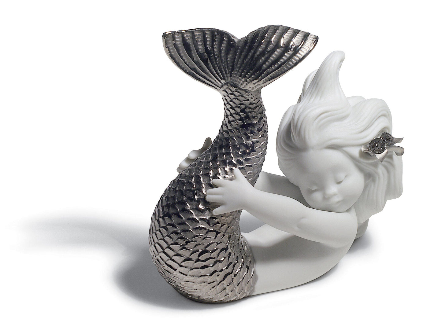 01008545 | Figura sirena Jugando con el mar. Lustre plata