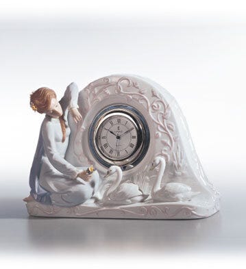 01005777 | RELOJ CISNES