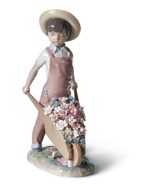 01001283 | Figura niño Carretilla con flores