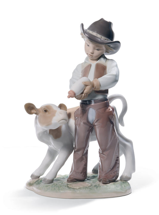 01008637 | Figura niño Vaquerito con ternero