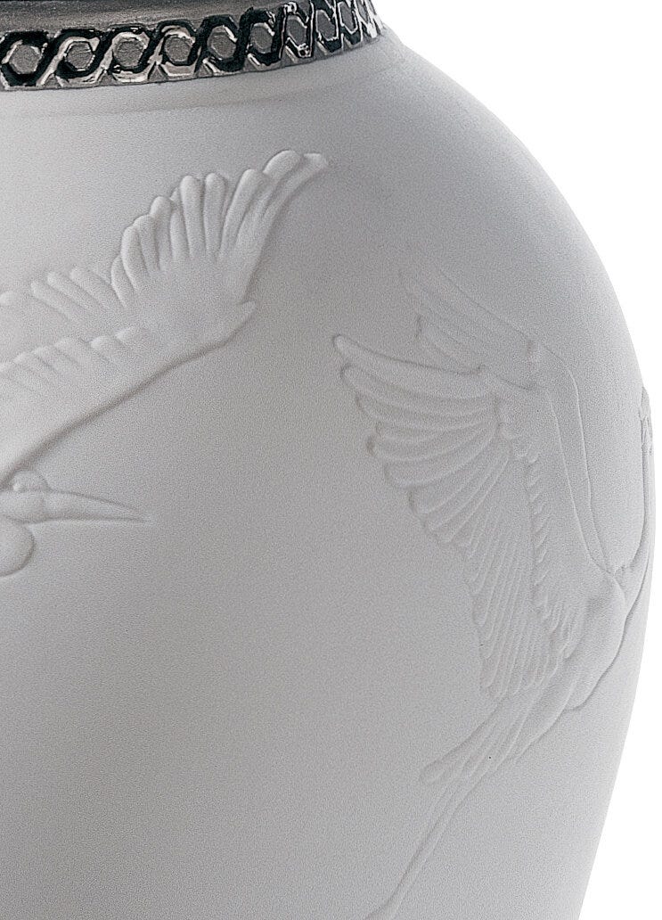 01007052 | Tibor garzas reales. Lustre plata