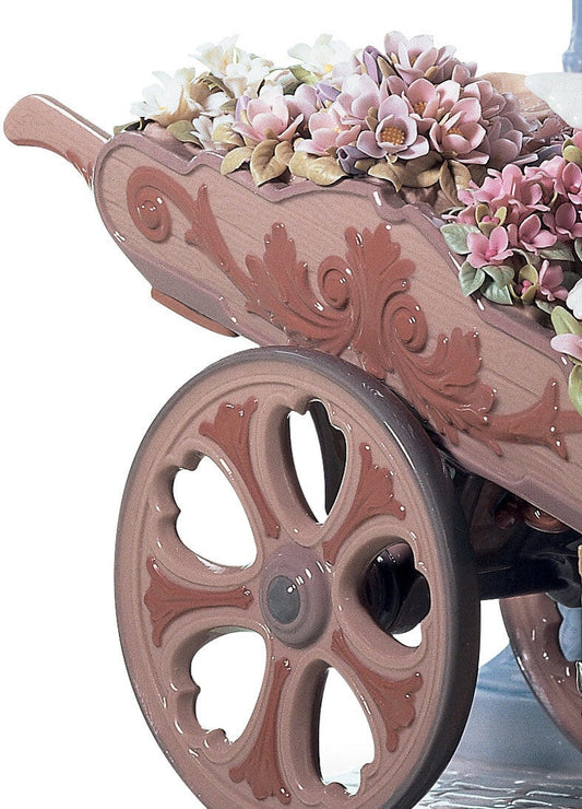 01006809 | Escultura mujer Flores en primavera