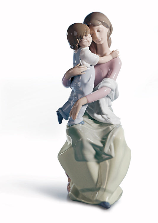 01006634 | Figura En el regazo de mamá