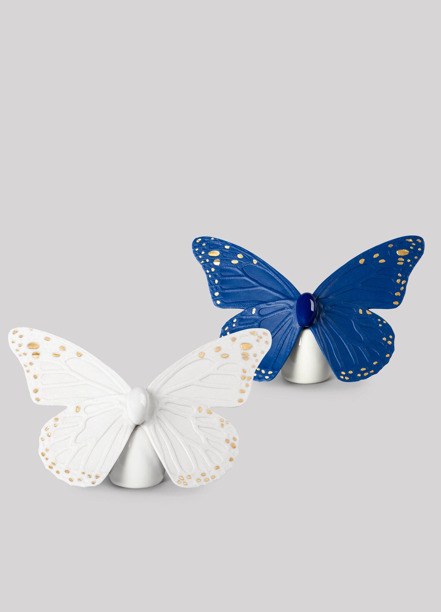 01009452 | Figura Mariposa. Lustre oro y azul