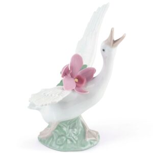 Pato corriendo con orquidea rosa – Santacreu Store
